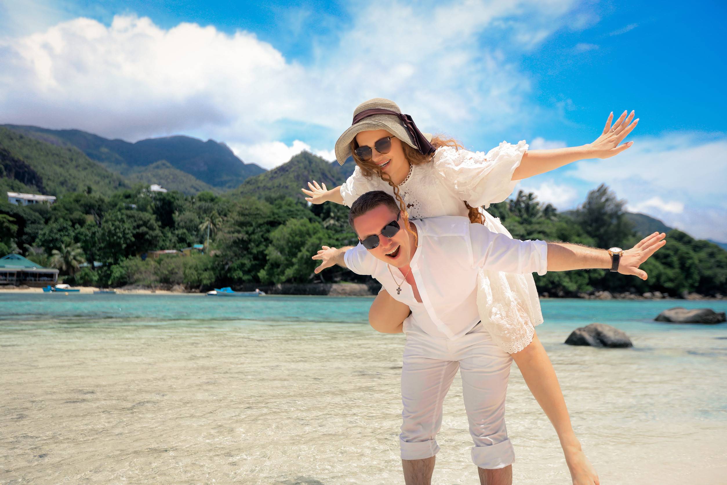 A Couple Enjoying A Romantic Honeymoon In The Seychelles