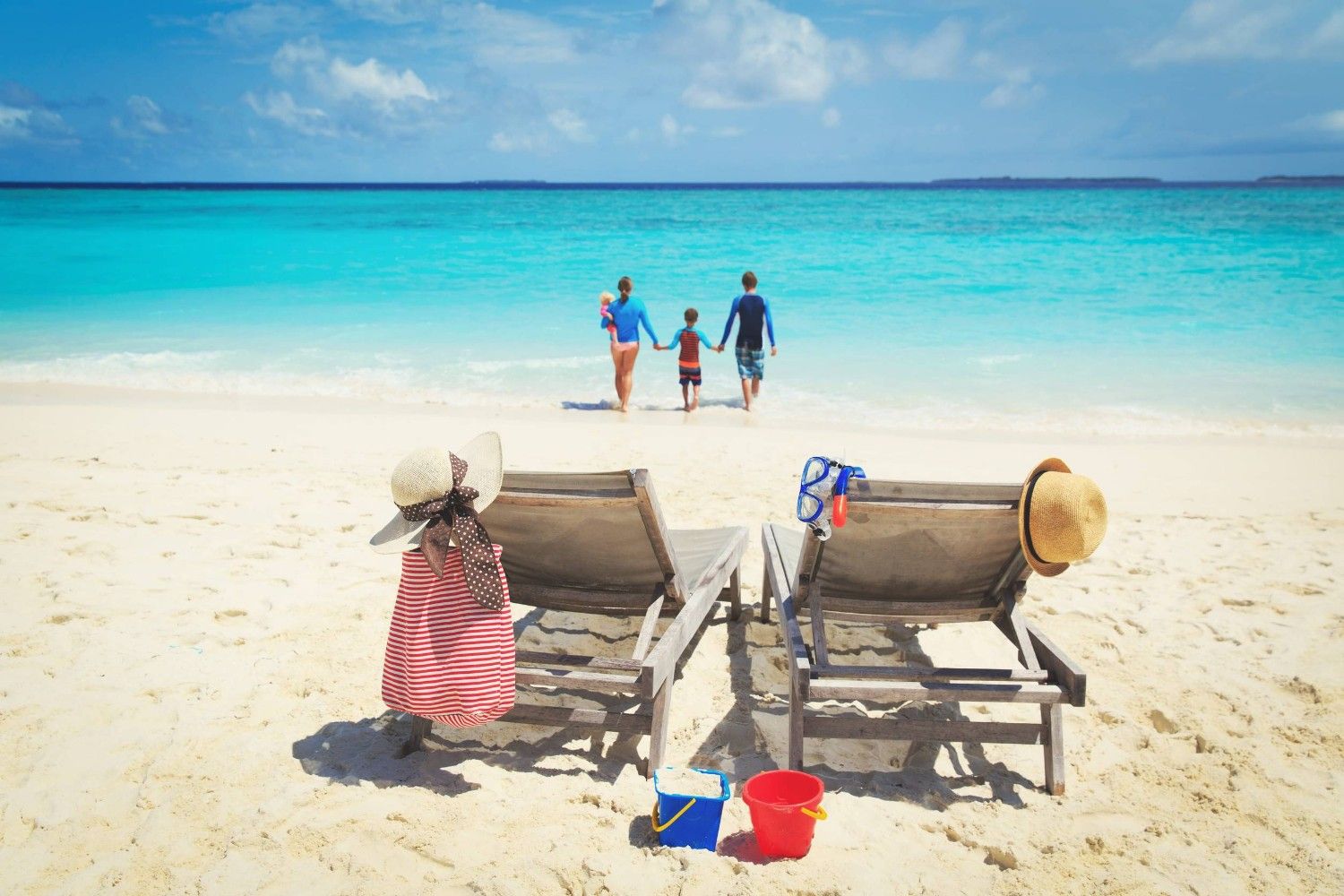 Family Enjoying Themselves In The Maldives