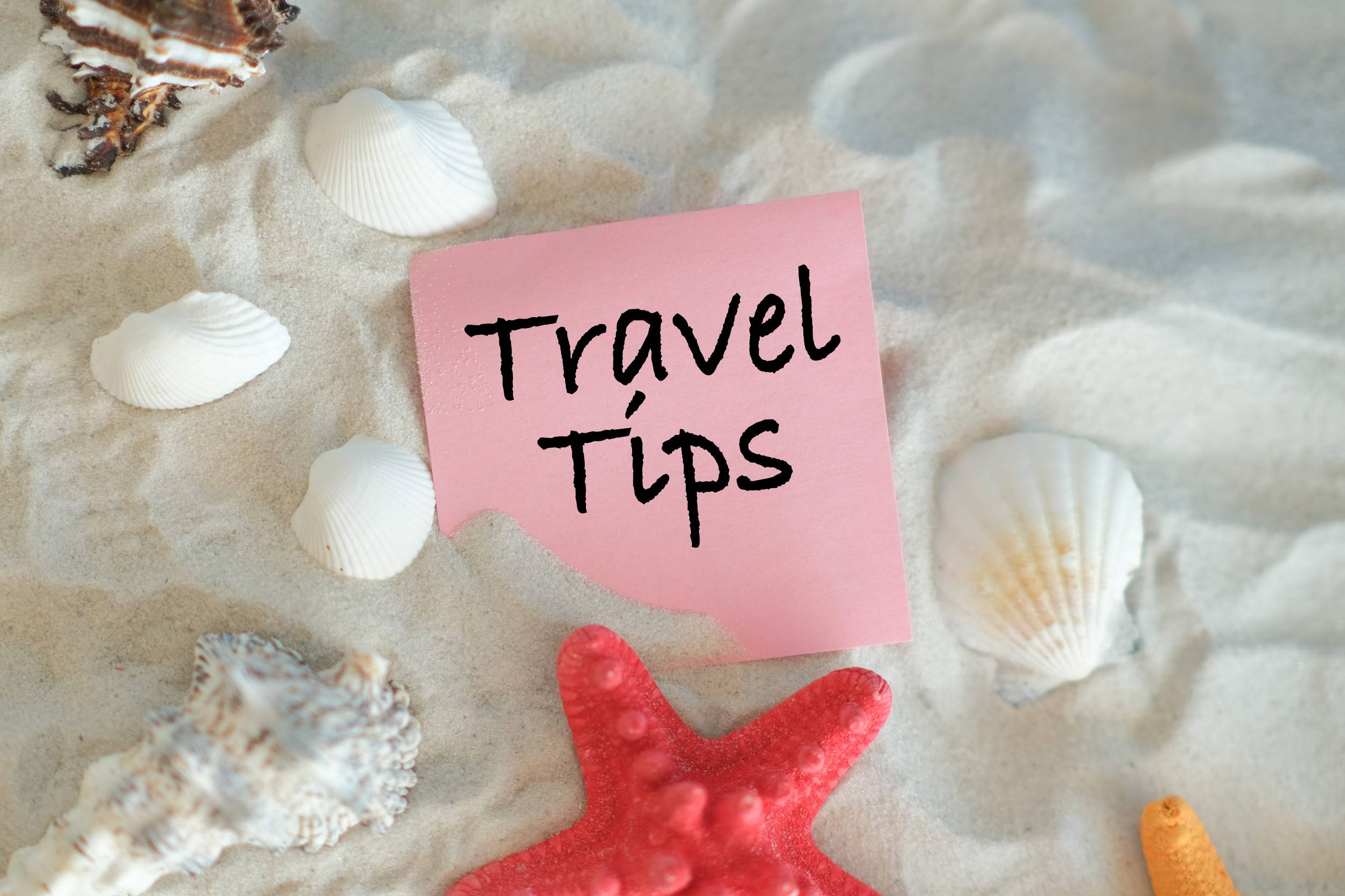 Travel Tips Text With Beach Objects Around