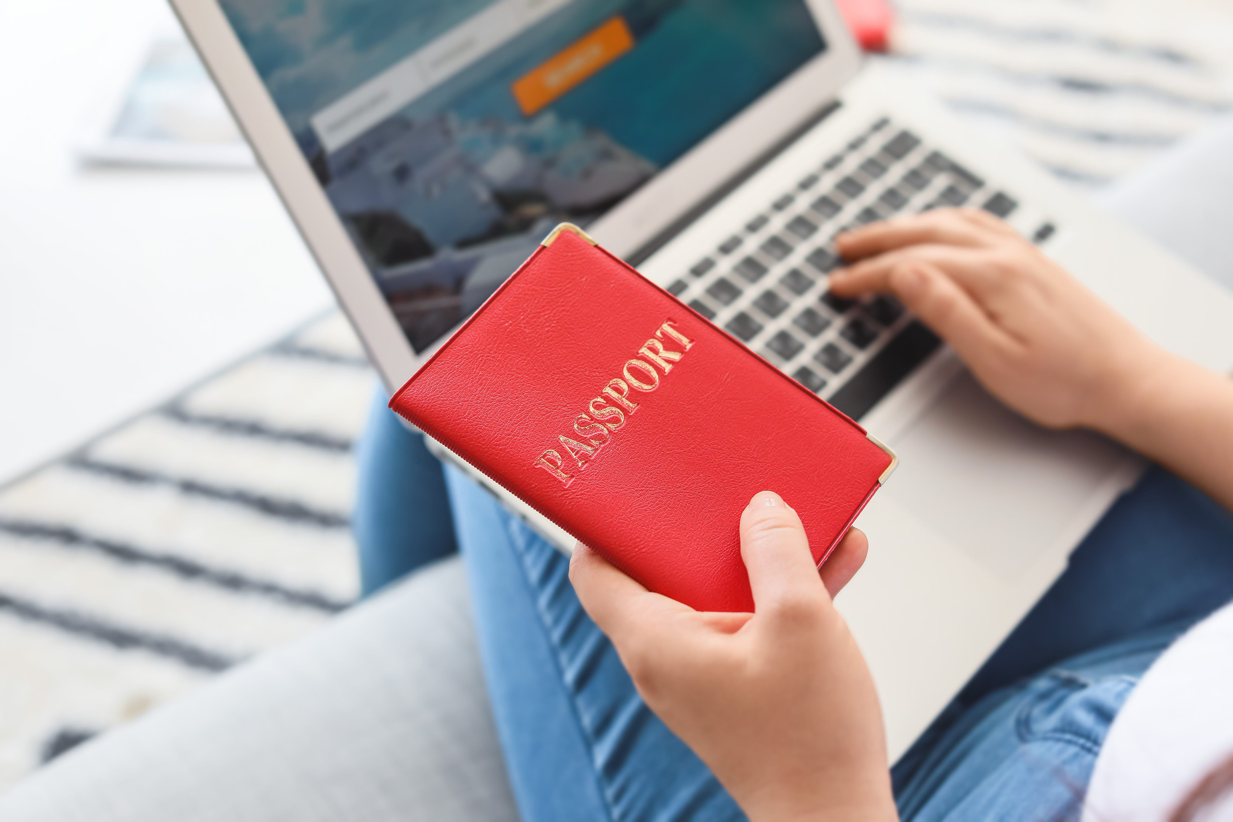 Woman Booking Tickets Online with Laptop