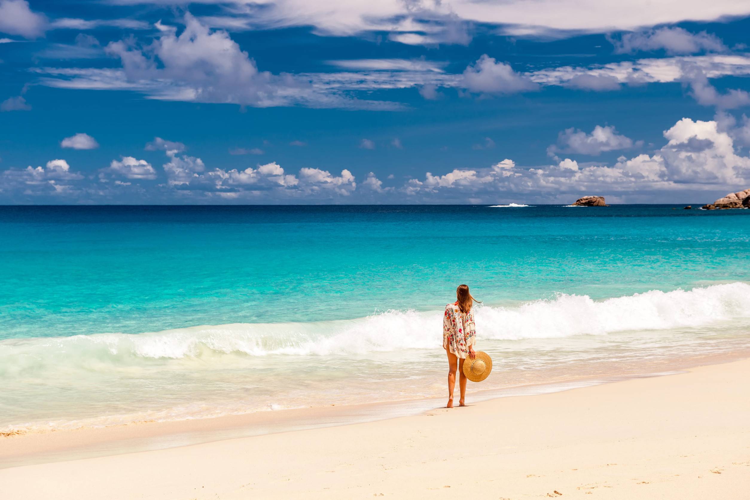 Woman Enjoying Anse Intendance Beach Mah